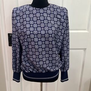 Vintage in cinq size 10 top w/ shoulder pads, and accents at waist and wrist